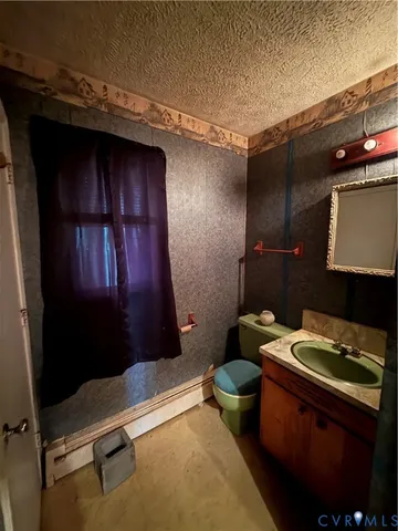 a bathroom with a sink and a toilet