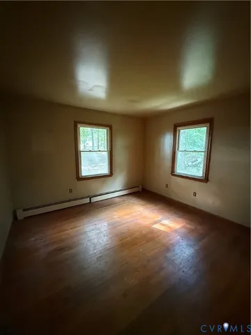 an empty room with windows
