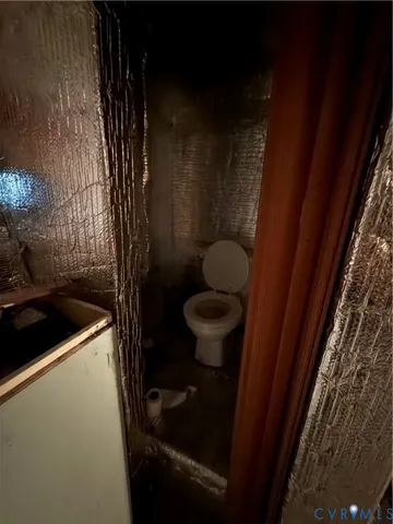 a bathroom with a sink and toilet
