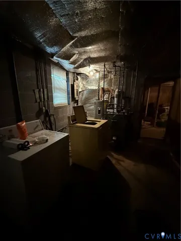 a kitchen with sink and refrigerator