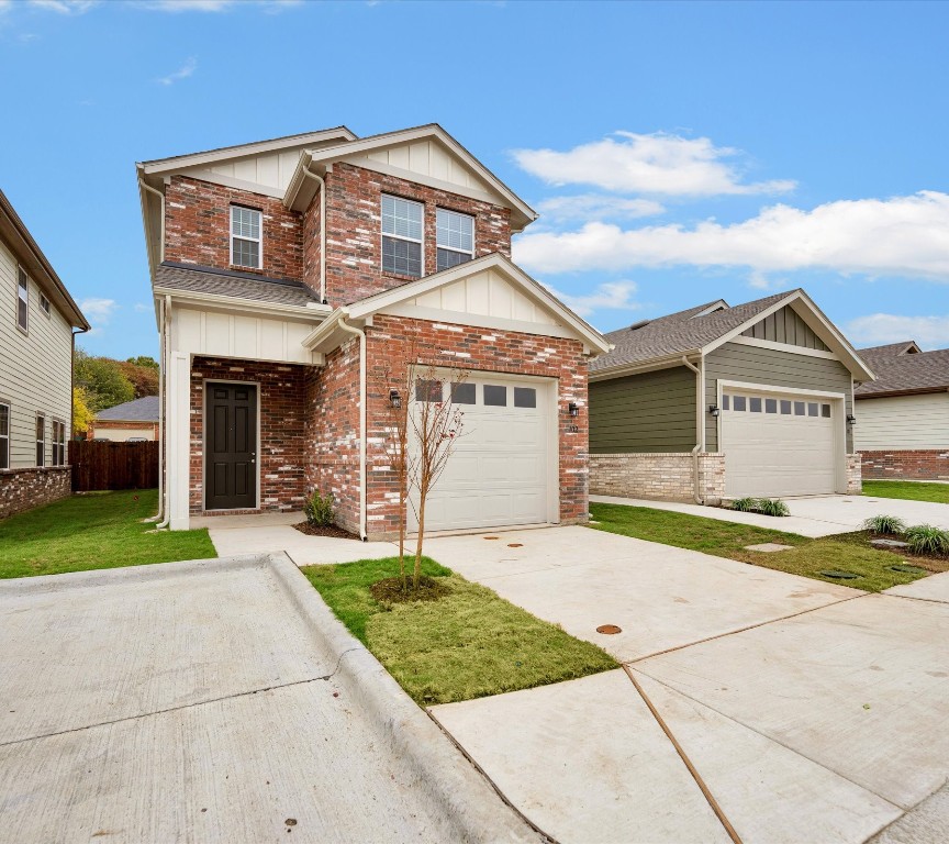 2703-107 Rockhill Road McKinney, TX 75072 - Photo 2 of 31 a front view of a house with a yard and garage