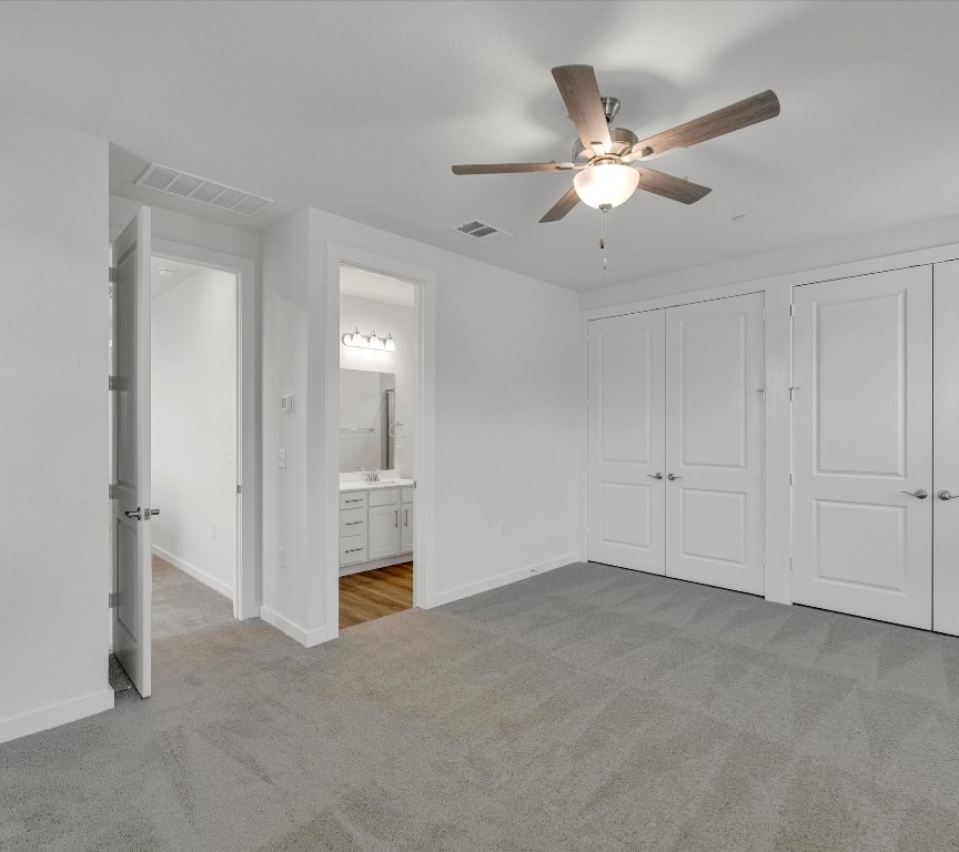 2703-107 Rockhill Road McKinney, TX 75072 - Photo 21 of 31 a view of an empty room with chandelier fan
