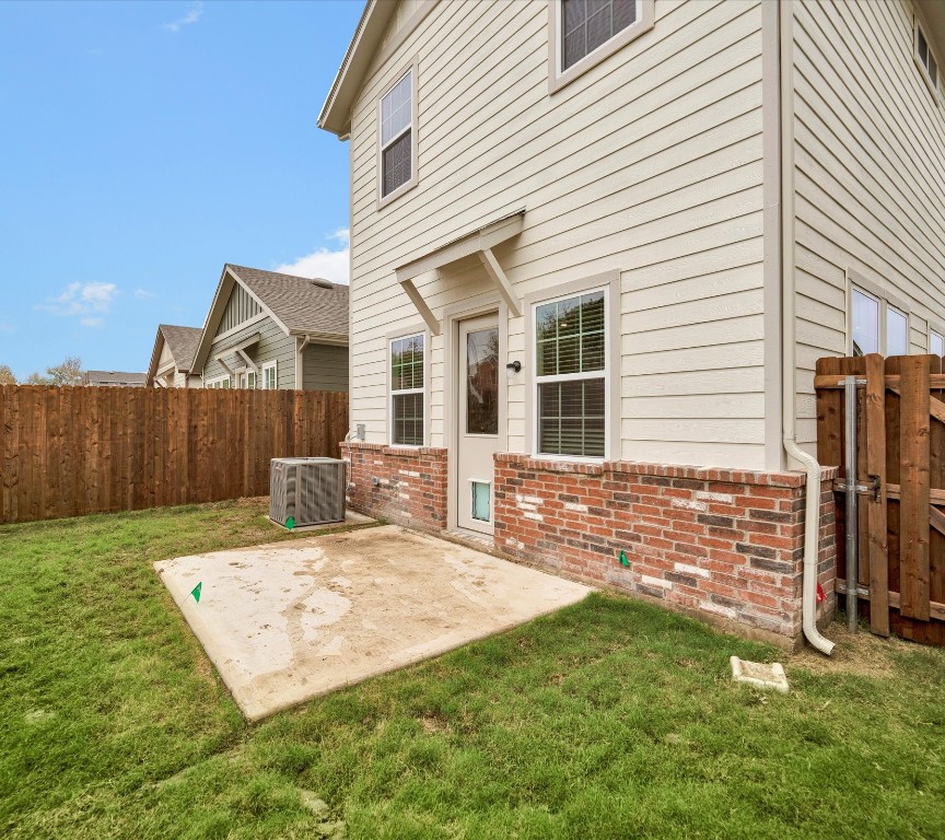 2703-107 Rockhill Road McKinney, TX 75072 - Photo 29 of 31 a view of a house with backyard and wooden fence