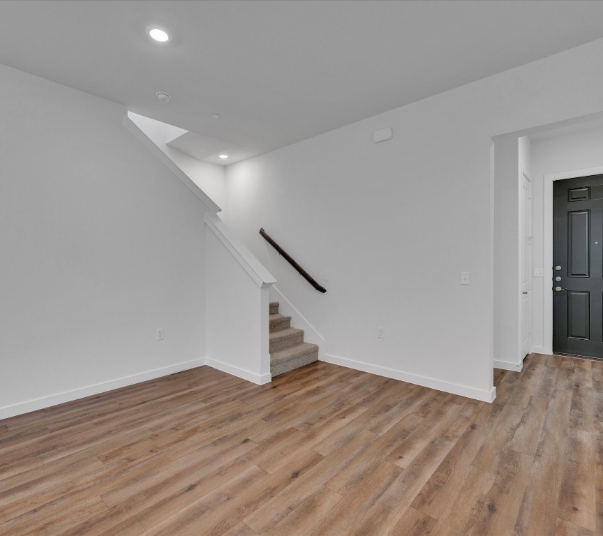 2703-107 Rockhill Road McKinney, TX 75072 - Photo 5 of 31 a view of empty room with wooden floor