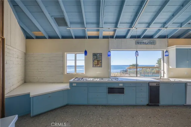 a bathroom with a toilet and a sink