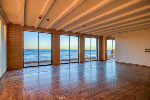 a view of a balcony with ocean view