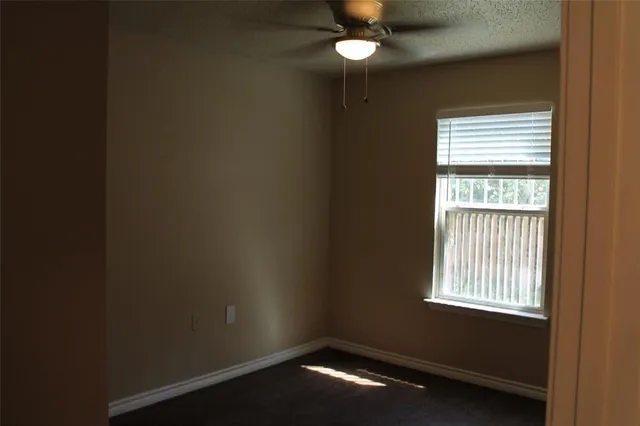 a view of a small space with a window