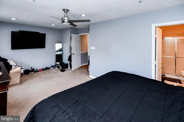 a view of a livingroom with a flat screen tv