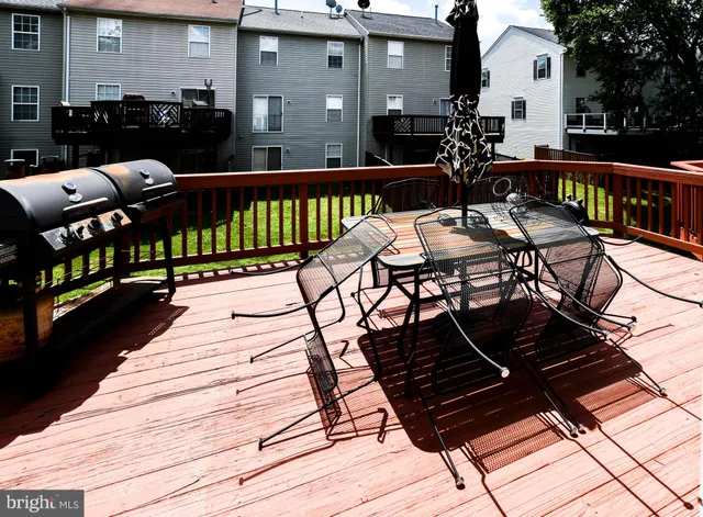 a view of a house with a yard porch and sitting area