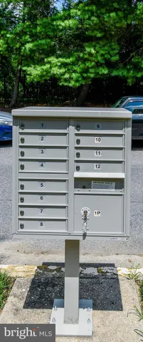 a view of a house with wooden fence
