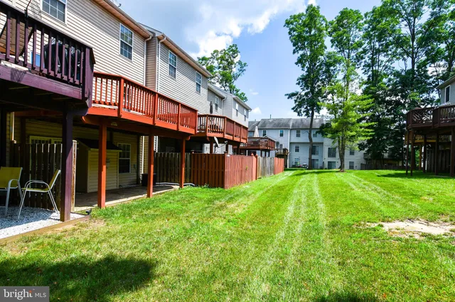 a sign that is in front of flowers