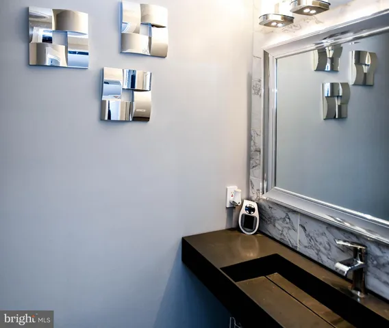 a room with a table and a lamp