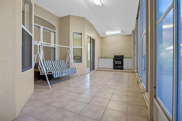a view of a hallway with seating area
