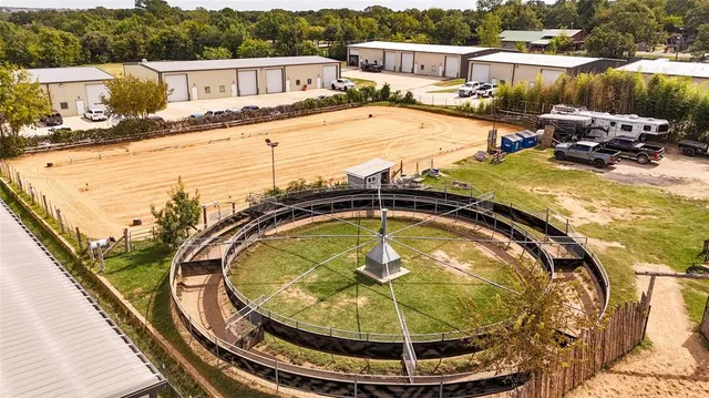 a view of a swimming pool with a chairs