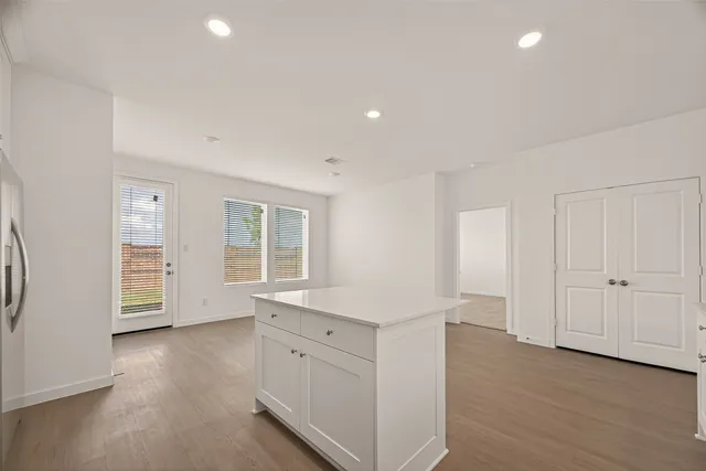 an empty room with windows