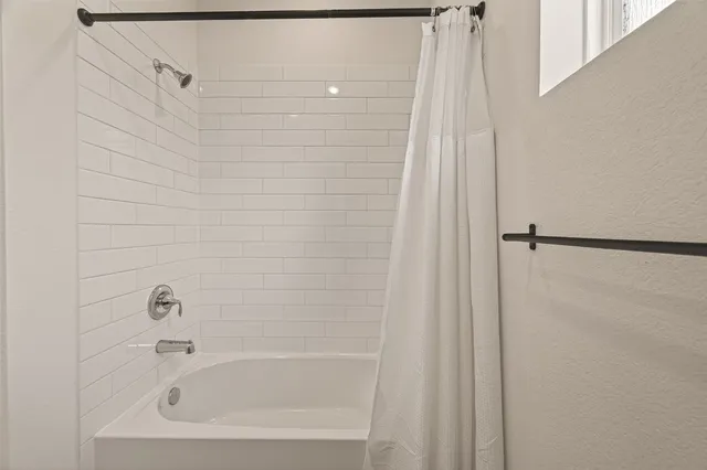 a bathroom with a bathtub
