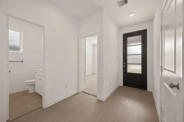 a view of a bathroom with toilet