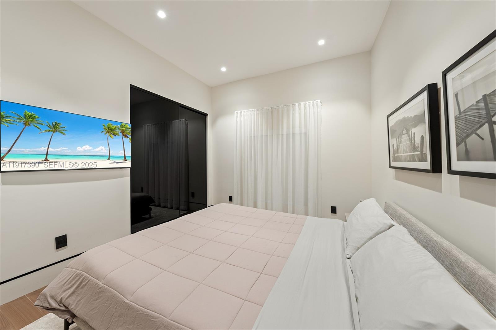 900 Washington Street Hollywood, FL 33019 - Photo 17 of 61 a large white bed in a white room