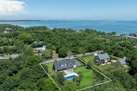 an aerial view of a house with a garden