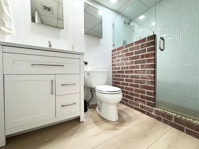 a bathroom with a toilet and a sink