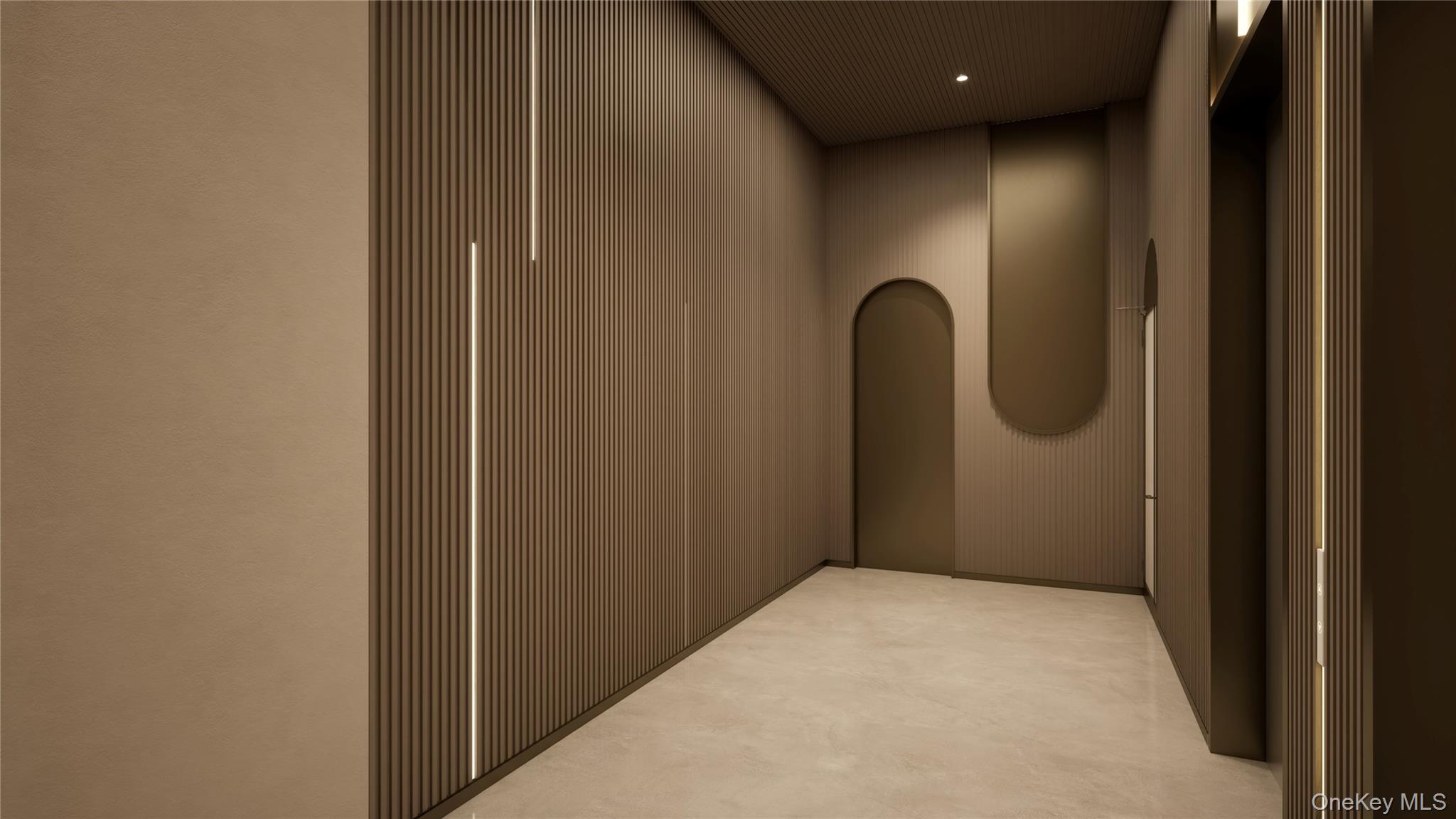 35-30 146th Street, Unit 307 Queens, NY 11354 - Photo 13 of 17 Corridor with elevator, arched walkways, and recessed lighting