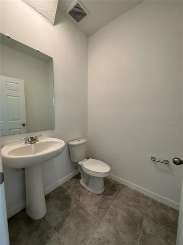 a large kitchen with cabinets