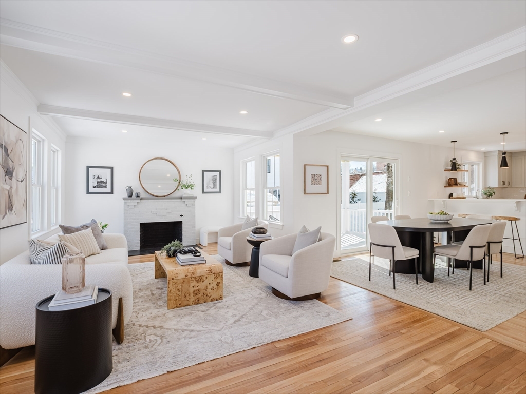 75 Foster Road, Unit 1 Belmont, MA 02478 - Photo 6 of 38 a living room with fireplace furniture and a wooden floor