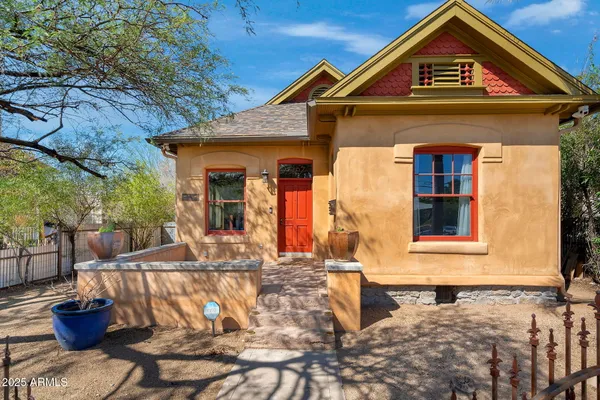a front view of a house with patio