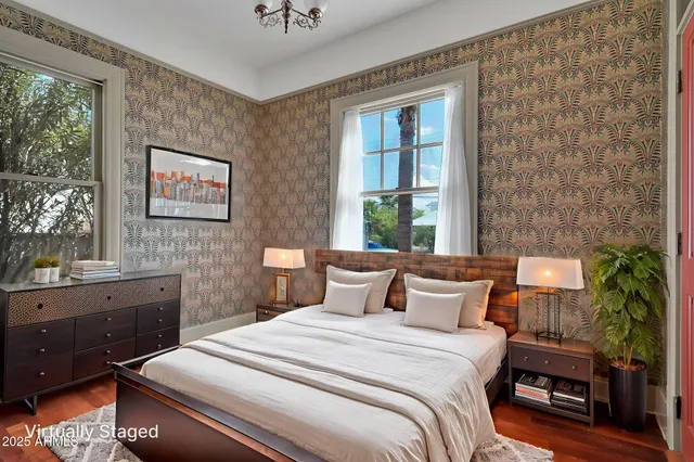 a view of a patio with a table and chairs