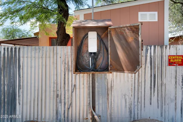 a front view of a house with a yard fountain