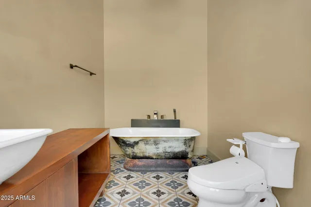 a utility room with a sink a washer and dryer