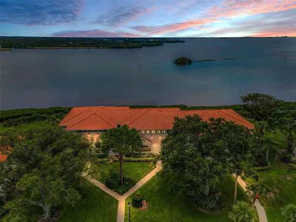 a view of a lake from a balcony