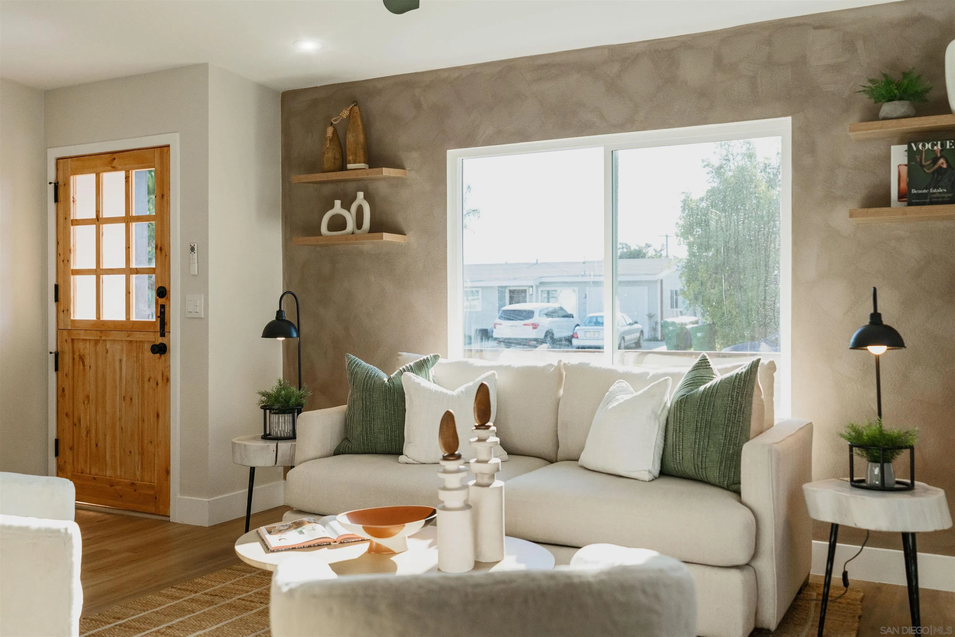 1426 Santa Rosa Street Oceanside, CA 92058 - Photo 29 of 73 a living room with furniture and a large window