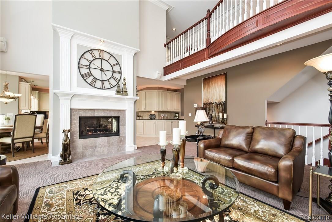 7942 Ranch Estates Road Clarkston, MI 48348 - Photo 11 of 61 A cozy fireplace is the highlight of this room.