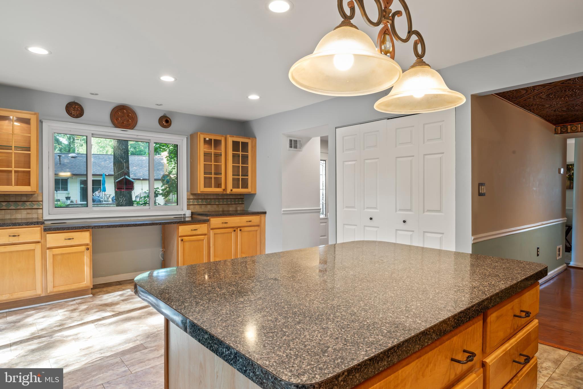101 Hayloft Circle Sterling, VA 20164 - Photo 14 of 39 a kitchen with stainless steel appliances granite countertop a sink and a granite counter tops