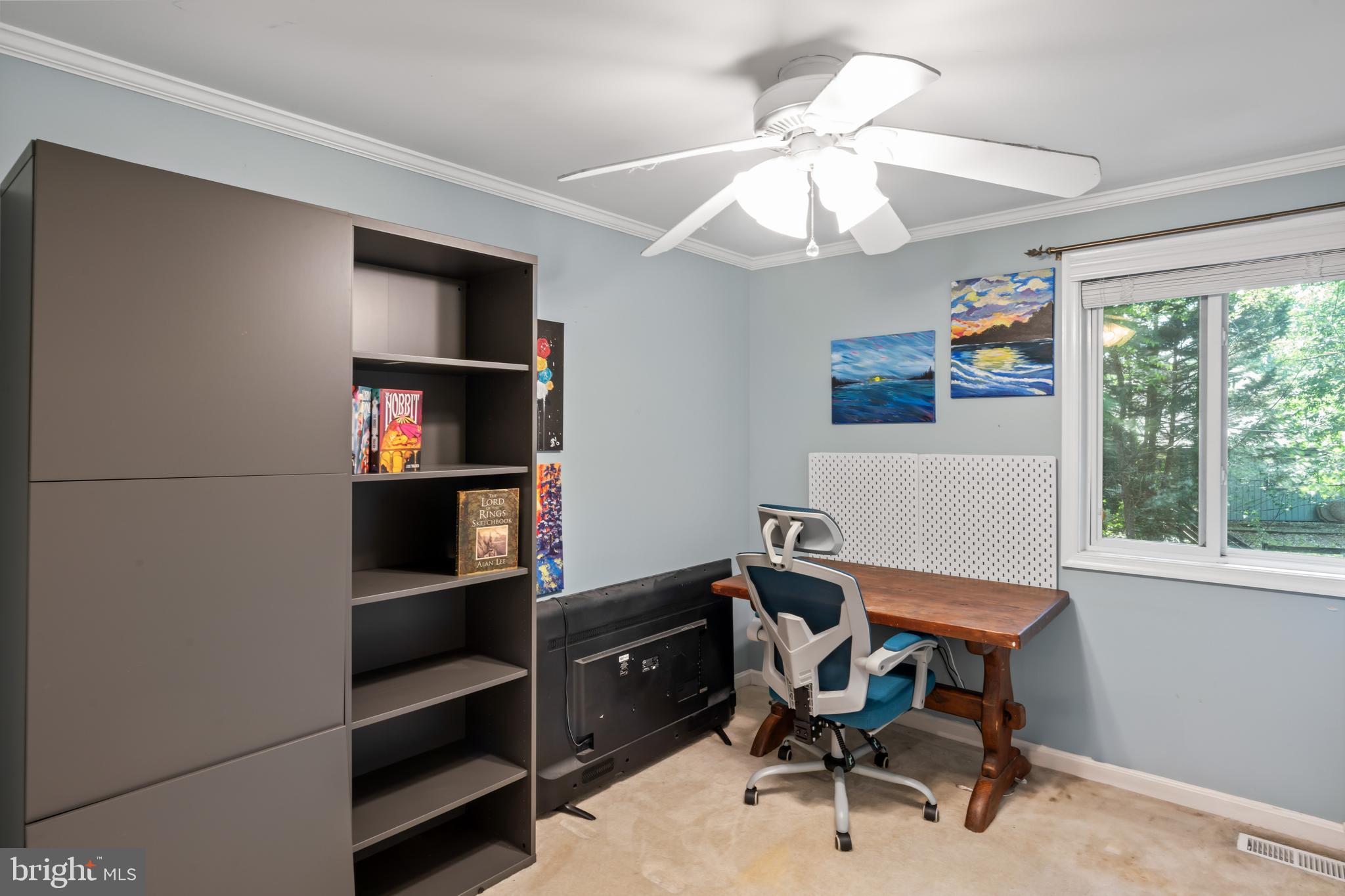 101 Hayloft Circle Sterling, VA 20164 - Photo 27 of 39 a view of a workspace with furniture and a window