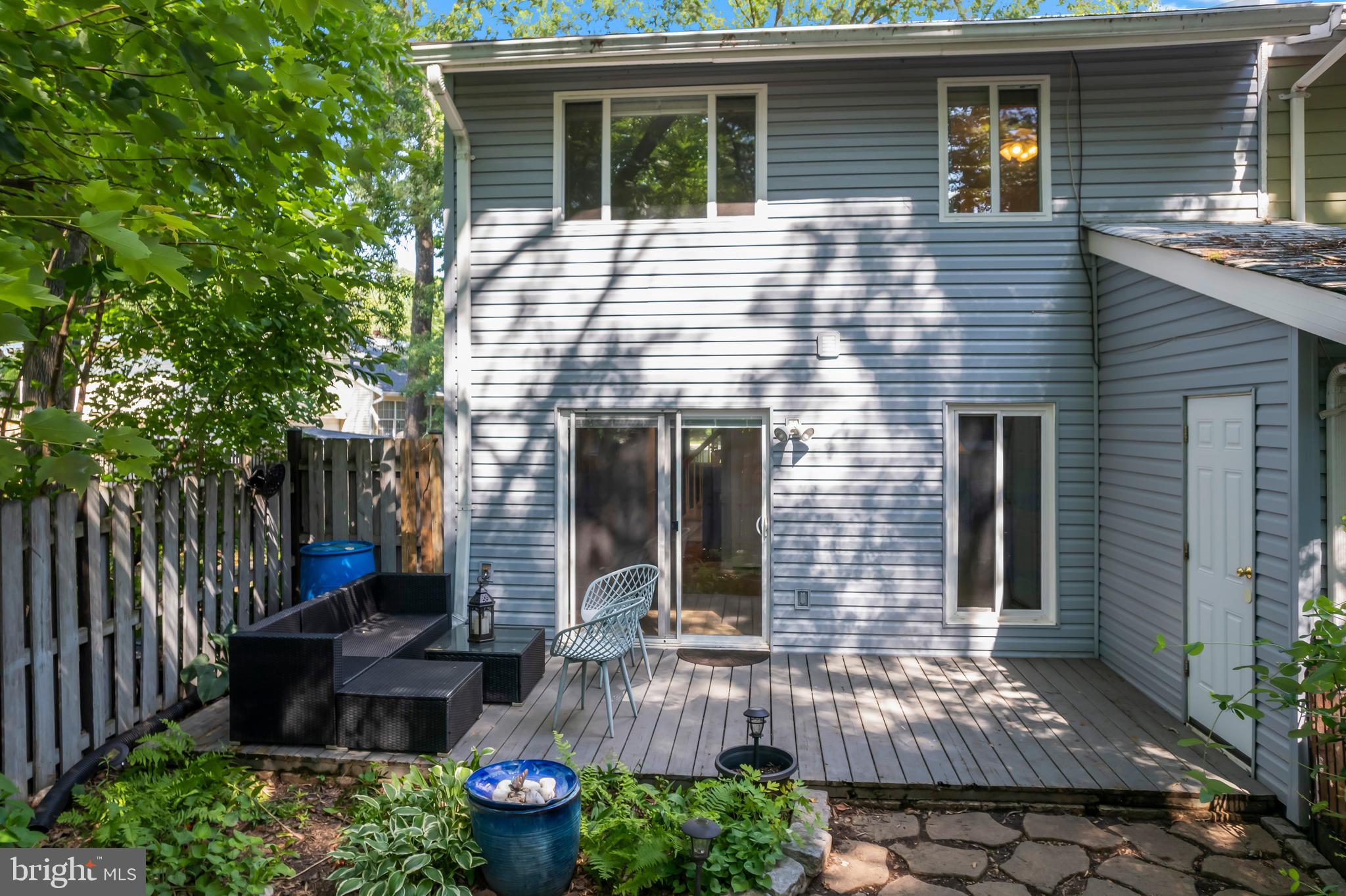 101 Hayloft Circle Sterling, VA 20164 - Photo 34 of 39 a front view of a house with garden