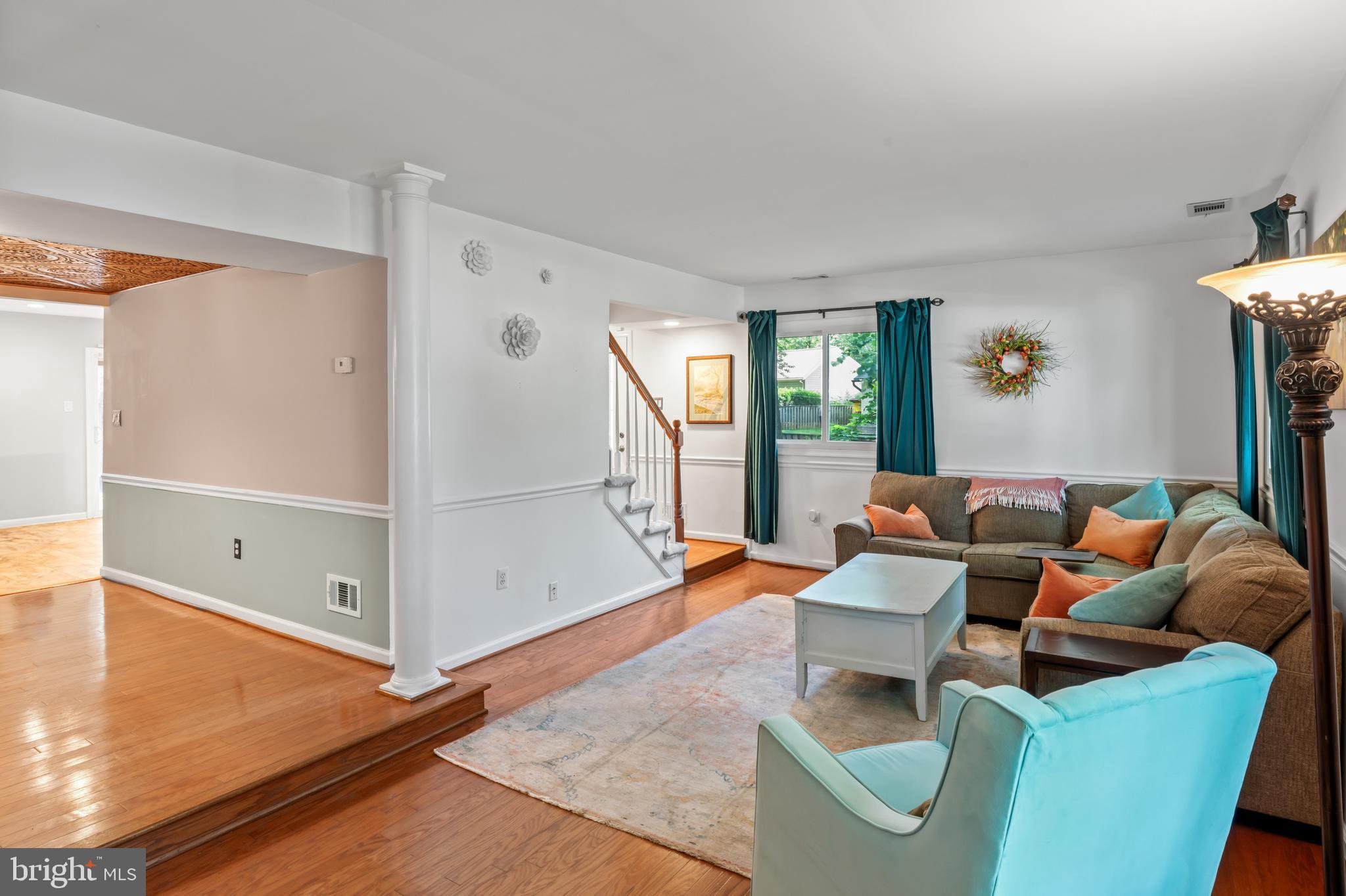 101 Hayloft Circle Sterling, VA 20164 - Photo 9 of 39 a living room with furniture and a window