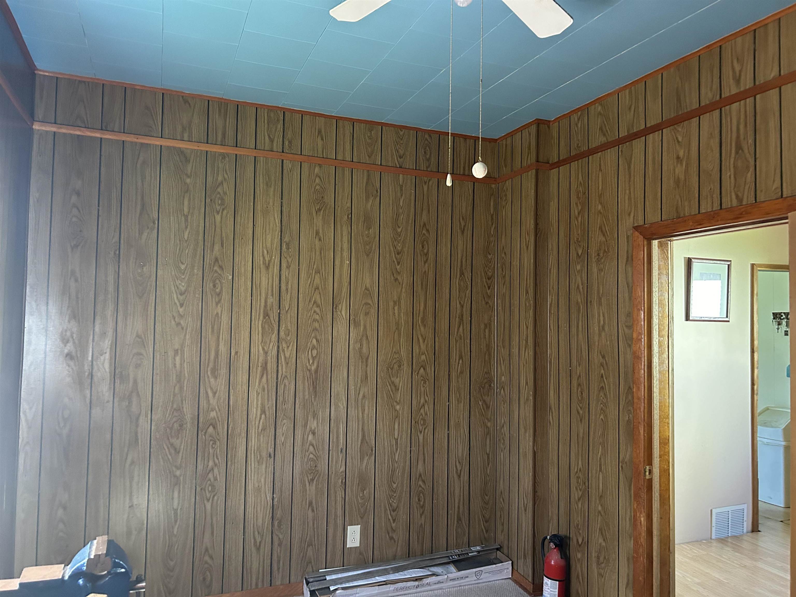 157 East 2nd Street Glidden, WI 54527 - Photo 5 of 15 Unfurnished bedroom with ceiling fan and hardwood / wood-style floors
