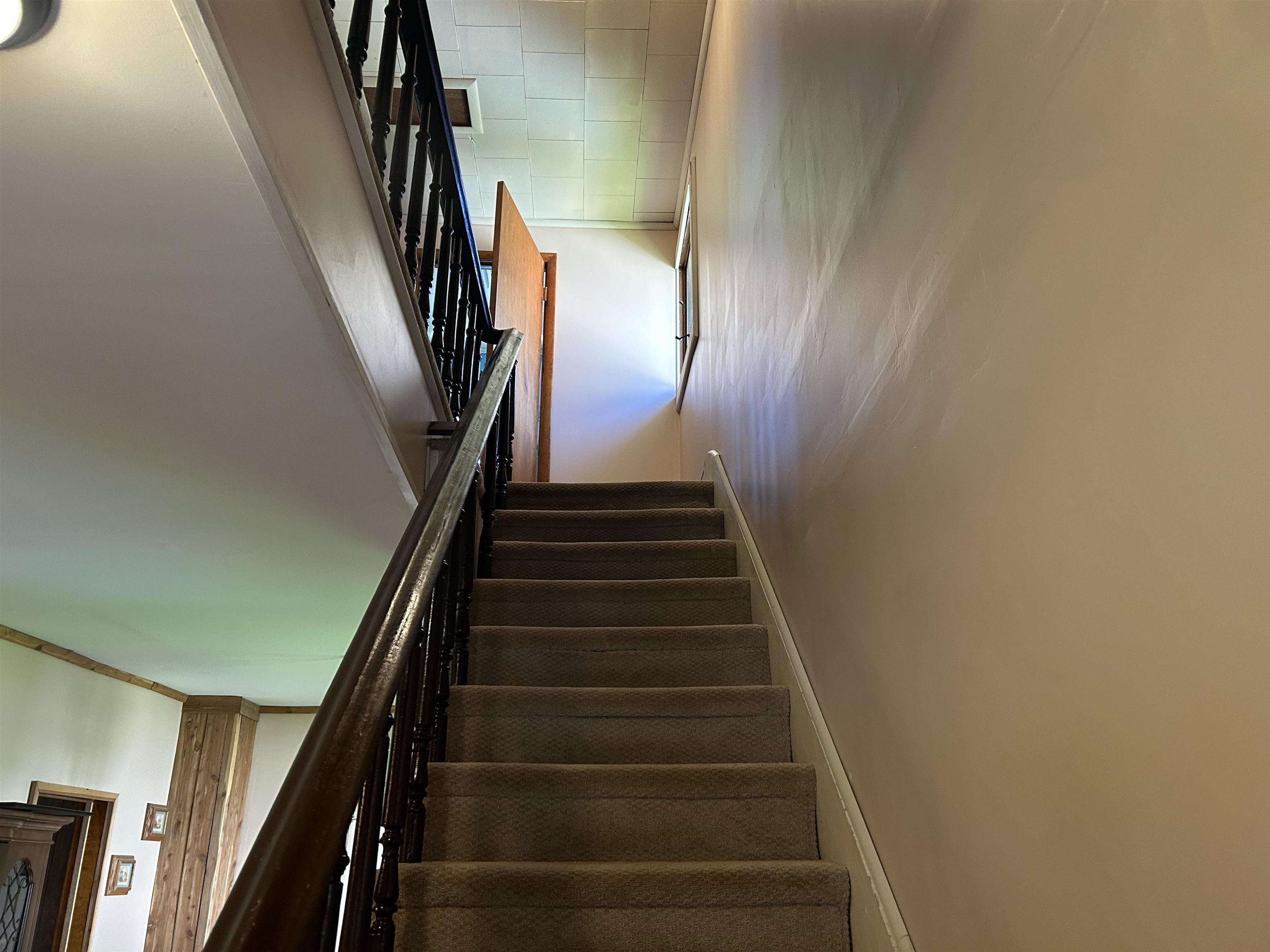 157 East 2nd Street Glidden, WI 54527 - Photo 9 of 15 Stairway with a towering ceiling and crown molding