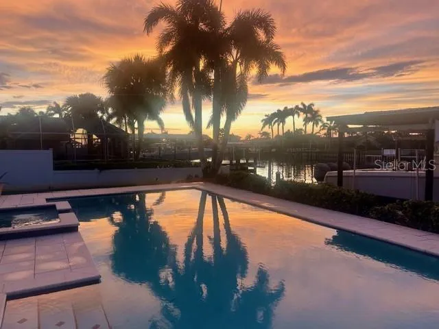 a view of swimming pool from a balcony
