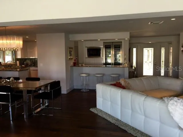 a kitchen with sink and cabinets