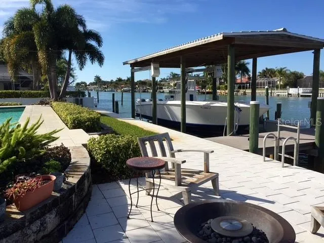 a outdoor space with furniture and umbrella