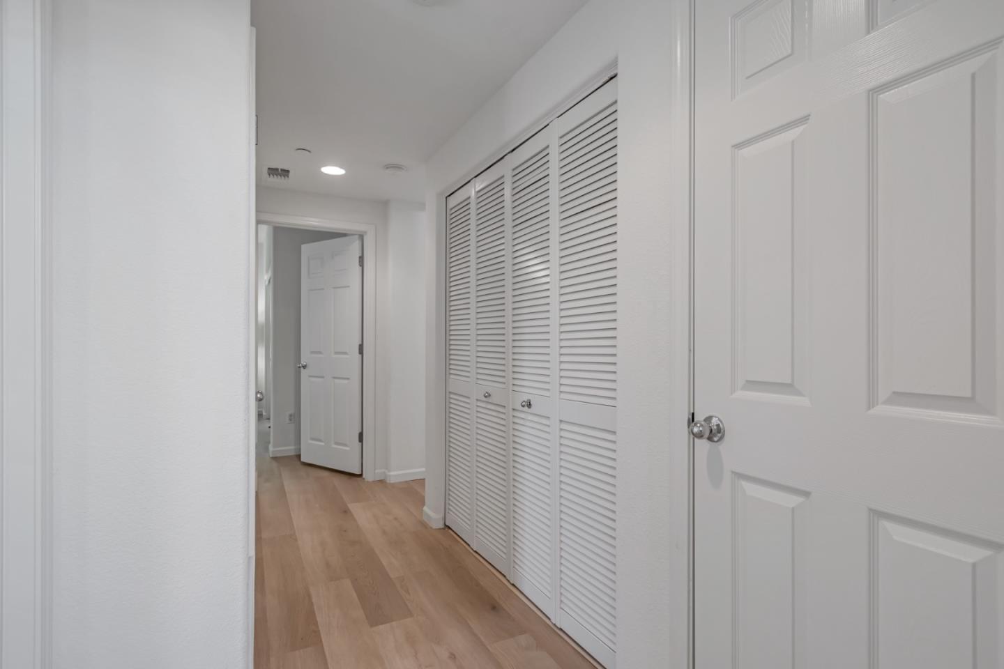 1744 Snell Place Milpitas, CA 95035 - Photo 13 of 35 a view of a hallway with wooden floor