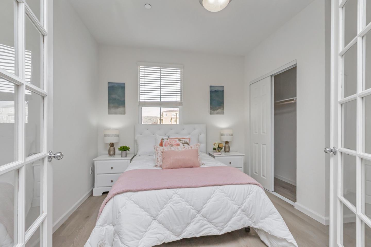 1744 Snell Place Milpitas, CA 95035 - Photo 14 of 35 a bedroom with a bed and a window