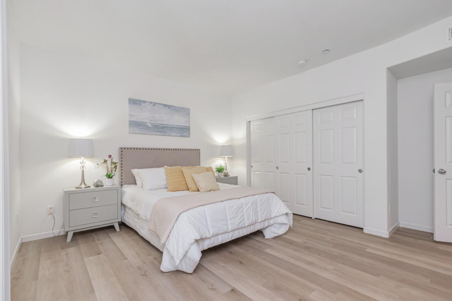 1744 Snell Place Milpitas, CA 95035 - Photo 17 of 35 a bedroom with a bed and a night stand