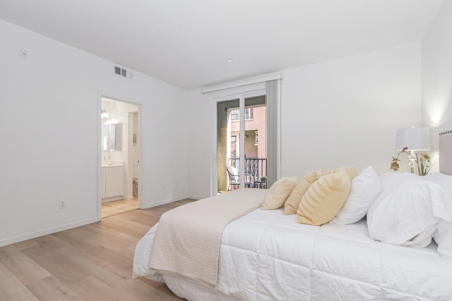 1744 Snell Place Milpitas, CA 95035 - Photo 18 of 35 a bedroom with a bed and a window