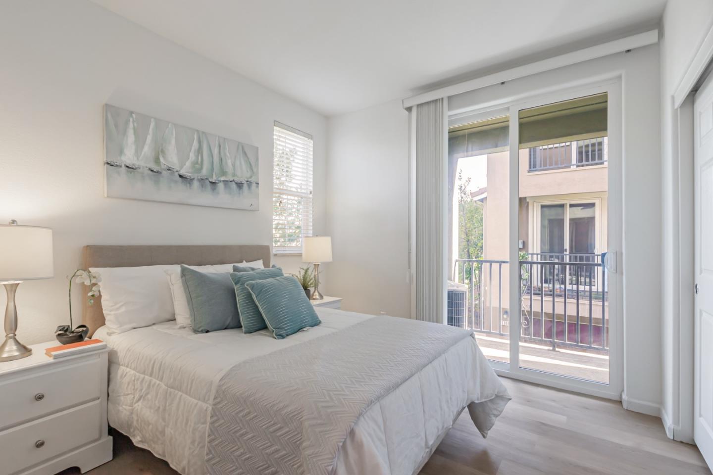 1744 Snell Place Milpitas, CA 95035 - Photo 19 of 35 a bedroom with a bed and wooden floor