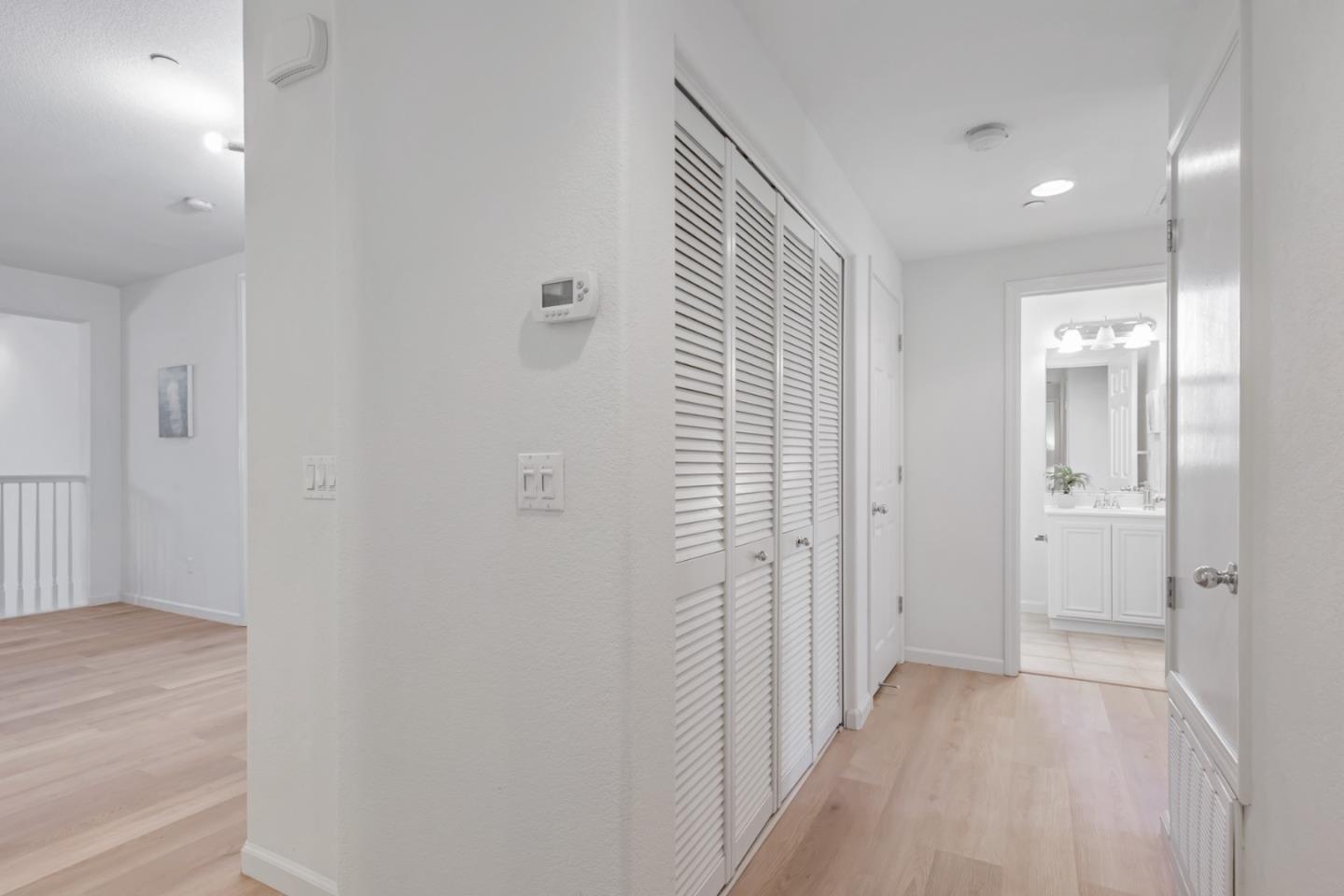 1744 Snell Place Milpitas, CA 95035 - Photo 21 of 35 a view of a hallway with wooden floor