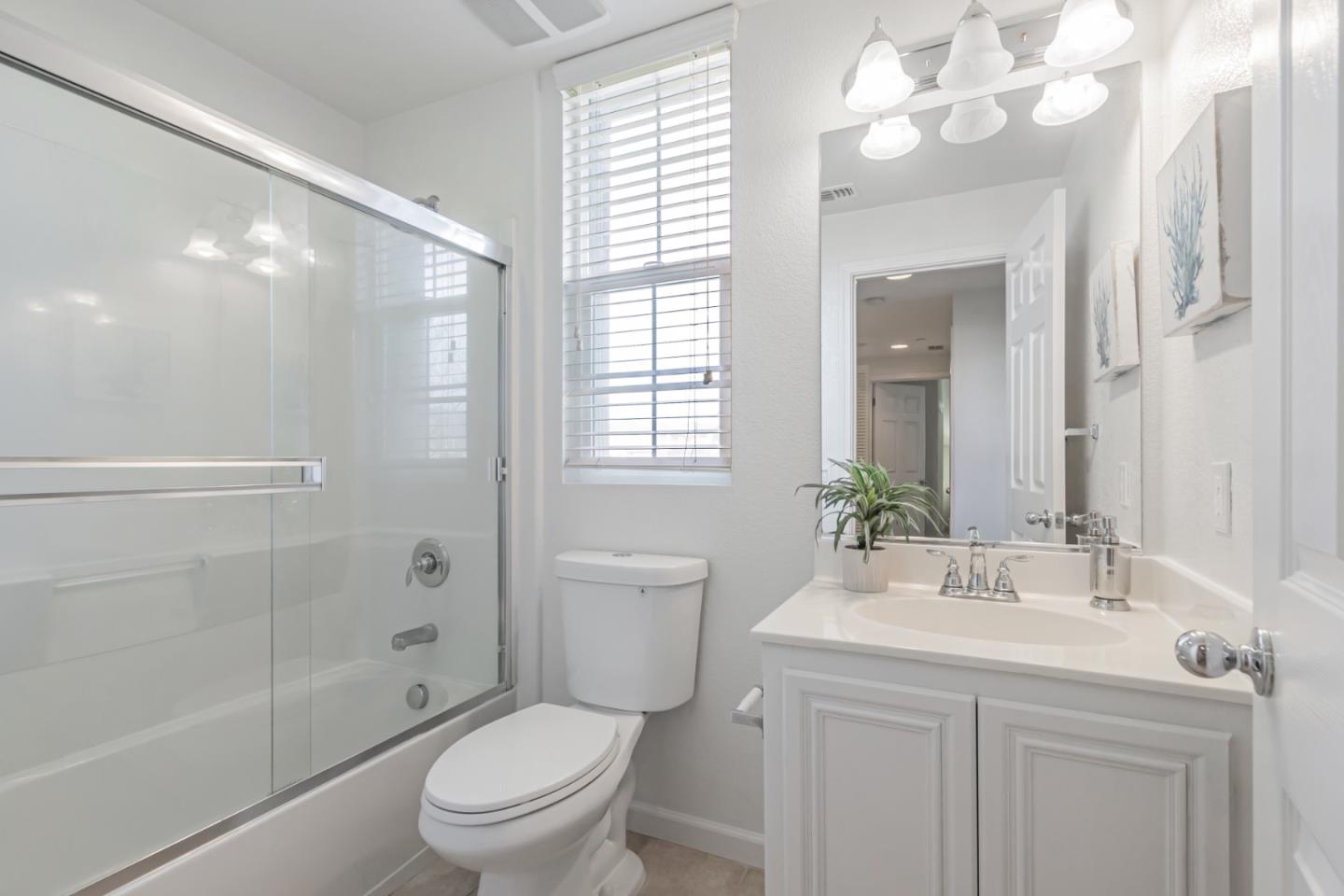 1744 Snell Place Milpitas, CA 95035 - Photo 24 of 35 a bathroom with a sink a toilet and shower